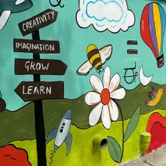 Another detail from the school mural, showing a hot air balloon, a bee, and a rocket ship. I used a simple, cartoonish style that is appealing to young children.