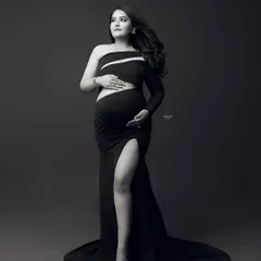 A powerful black and white portrait that uses shadows and highlights to sculpt the body. This is a key technique for creating dramatic and artistic images.