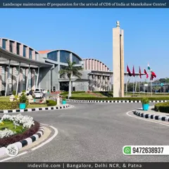 The grand entrance of the Manekshaw Centre, a prestigious venue where I handle the landscape design and maintenance. The manicured lawns, colorful flower beds, and clean driveways create an impressive and welcoming first impression.