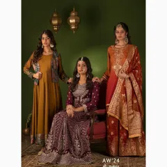 A group portrait for the SHREE Autumn Winter '24 collection. This shot was composed to feel like a classic painting, highlighting the rich colors and textures of the ethnic wear in a formal, elegant setting.