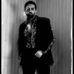 A striking black and white portrait of Ayushmann Khurrana. I love using high contrast to bring out the texture of the clothing and the subject's expressive features.