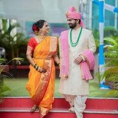 Here is my bride looking radiant in a traditional orange Navari saree. I offer full draping services to make sure the saree is not only beautiful but also comfortable to walk and move in throughout the ceremony.