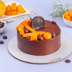 During mango season, I offer a variety of flavor combinations. This picture shows my Chocolate Mango cake, a rich and tropical treat that perfectly balances deep chocolate with sweet, fresh mango.