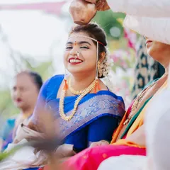 A candid shot of a bride's beautiful smile during a wedding ritual. My goal is to capture the authentic emotions and small, happy moments that make up your special day.