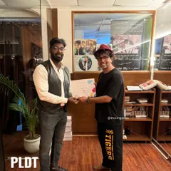 Presenting a certificate to a graduate of our PLDT program. We wish all our students the very best in their future dance endeavors.