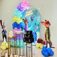 A Zootopia-themed party for Aarvi's 8th birthday, with large cutouts of Nick Wilde and Judy Hopps.