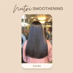 A visual showcase of the beautiful shine you can expect from our Nutri-Smoothening treatment, which is perfect for dull, dry, or damaged hair.