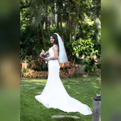 Here is one of my beautiful brides, Wilsy, looking absolutely radiant in her custom-fitted mermaid gown. We designed this piece to embody grace, with delicate hand-embroidery and a silhouette that felt both timeless and personal to her.