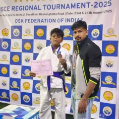 Another champion from the CISCE Regional Tournament. I stand with my student as he proudly displays his medal and certificate.