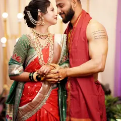 A stunning portrait of the couple, capturing their chemistry and the beauty of their traditional wedding attire.