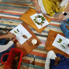 Using leaves collected from a nature walk, children create their own "Little Vinayaka" art. We love incorporating natural materials into our crafts to connect kids with the world around them.