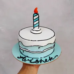 A blue and white comic cake. This style is all about the bold black lines that trick your eyes into seeing a 2D drawing instead of a 3D cake.