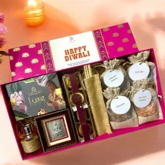 This premium hamper is a perfect example of how I blend luxury with tradition. It features a curated selection of Smoor luxe chocolates, a silver Lakshmi ji frame for blessings, gourmet baklava, and an assortment of flavored dry fruits, all presented in a beautiful designer box for Diwali.