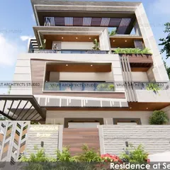 Another perspective of the upcoming 10,000 sqft residence in Sector 46, Noida. This view highlights the interplay of textures, from stone cladding to smooth plaster, and the integration of green spaces on the balconies.