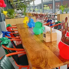 Another view of the themed table decor, showing the attention to detail that carries the theme throughout the entire party space.