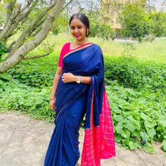 Enjoying a moment outdoors. I love the combination of this royal blue and pink Mysore silk saree.