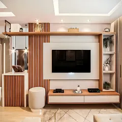A comprehensive living room unit that combines a TV console with a stylish partition of vertical wooden slats and a small bar or display counter. This design is perfect for open-plan living spaces.