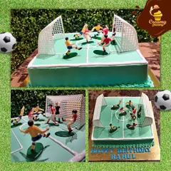 A dream cake for any football fan. I recreated an entire football pitch, complete with goals and players in the middle of a match. It's a guaranteed goal for a birthday celebration.