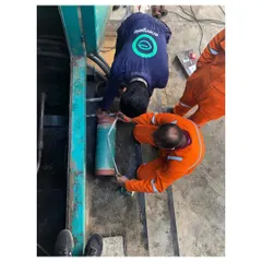An overhead view of my engineers meticulously working on an installation. This attention to detail is a core part of my process, guaranteeing that every connection is secure and every component functions as designed for long-term reliability.