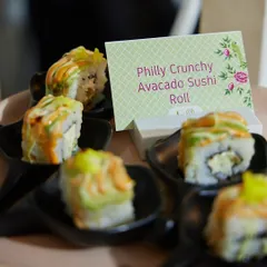 A closer look at our Philly Crunchy Avocado Sushi Rolls. Each piece is a perfect combination of creamy avocado, rich cream cheese, and a crunchy texture, making it an irresistible bite.
