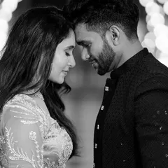 A classic black and white close-up. Removing color allows the focus to fall entirely on the emotion and the intimate connection between the couple, creating a timeless and powerful portrait.