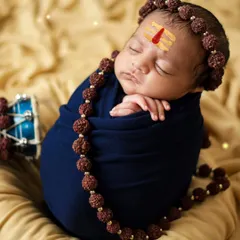 Har Har Mahadev! On a client's special request, we created this powerful yet gentle Shiva-themed setup for their newborn. It was an honor to capture this divine concept.