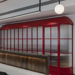 We believe work can be exciting, so we gave this 3200 sq. ft. Mumbai office a whimsical twist. The conference room is inspired by the iconic UK telephone booth, infusing a playful and memorable element into the daily work environment.