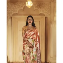 A closer portrait from the same regal series, focusing on the intricate details of the saree and the model's confident posture. This shot highlights the craftsmanship of the garment and the elegant styling.
