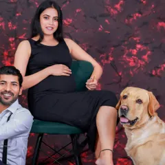 A beautiful maternity portrait celebrating the expecting parents and their beloved family dog. We welcome pets to be a part of your special family moments.