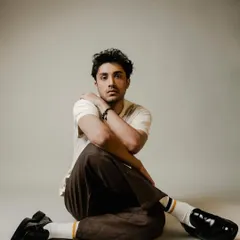 A relaxed and contemporary look for Lakshya Parikh. I styled him in a cream knit polo with brown trousers and loafers for a soft, vintage-inspired aesthetic.