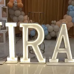 A close-up of the custom light-up marquee letters I provide, which can spell out any name to personalize your event.