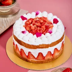 This Vanilla Fraisier has been a signature favorite for over three years. It’s made with a soft vanilla sponge soaked in strawberry goodness, and layered with a light mascarpone chantilly and fresh strawberries.