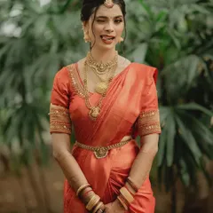 A fun, playful wink from the bride. This shows that even in traditional attire, a bride's personality can shine through.