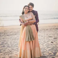 Revant and Soha wrapped in a warm embrace on a serene beach. The soft light and their connection make for a perfect romantic photograph.
