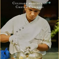 The sizzle of ingredients hitting a hot pan at a live cooking station. This moment captures the energy and freshness of our interactive counters, where guests can watch their food being prepared right before them.