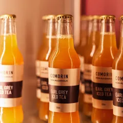 For a more subtle refreshment, try our house-made Earl Grey Iced Tea. It's lightly brewed and chilled, offering a sophisticated and cooling drink to accompany your meal.