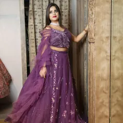 A full-length shot for the ethnic wear brand Odhni. I positioned the model to showcase the beautiful drape and intricate embroidery of the lehenga, using the elegant interior to complement the outfit's grand design.