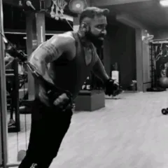 Performing a cable crossover to sculpt the chest. This exercise helps in creating definition and striations, showing my technical approach to bodybuilding.