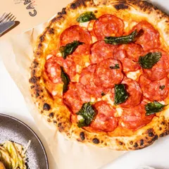 Today’s forecast: 100% chance of pepperoni. This classic pizza, with its spicy pepperoni and bubbly mozzarella on our signature charred crust, is always a crowd-pleaser.