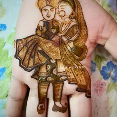 The same couple portrait, now fully shaded and detailed. You can see how the initial outline is transformed into a lively, three-dimensional scene.
