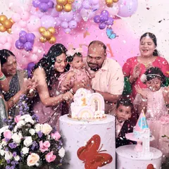 The big moment! We make sure to capture the excitement of the cake cutting, complete with a shower of confetti and cheers from the whole family.
