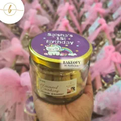 A jar of my handcrafted Almond Cookies, made with premium almonds for a perfect crunch. These were part of a large custom hamper order.