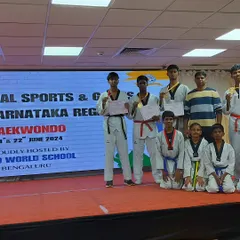 Our students proudly display their medals and certificates after competing in the Karnataka Regional Taekwondo tournament. We prepare students for competition at the local, state, and national levels.