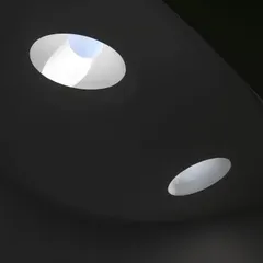 A detail of the skylights at the Vismaya museum. The abstract, sculptural quality of the openings on the roof contrasts with the soft, diffuse light they create in the galleries below.