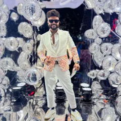 Posing in a stunning mirrored entryway. My outfits are designed to stand out in any setting.