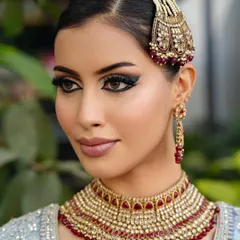 A side profile showing the clean lines and artistry of the Arabic eyeliner.