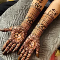 A perfect design for an engagement ceremony. We celebrated the couple's union by featuring their initials, the word "LOVE," and a beautiful drawing of their engagement rings on the palms.
