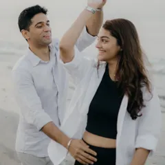 A spontaneous dance on the sand. I love capturing these moments of unscripted joy that truly reflect a couple's playful dynamic.