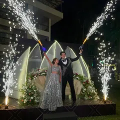Let the sparks fly! We love adding exciting elements like cold pyro guns to make your Sangeet night photos absolutely epic.