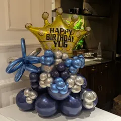This custom balloon centerpiece is perfect as a standalone gift or as a decoration for a cake table.
